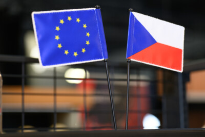 European Union flag and Czech Republic flag displayed together at retail trade show