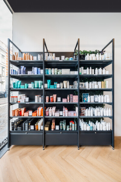 Pitch 25 shelving display in health and beauty retail with organized skincare products across six tiers