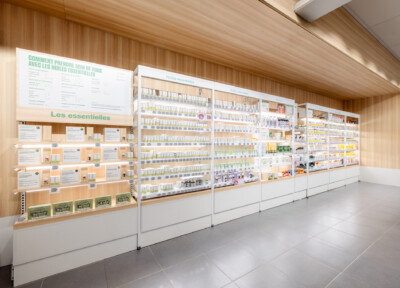 Pitch 25 shelving with essential oils display in health & beauty retail environment, wooden backing with product information signage