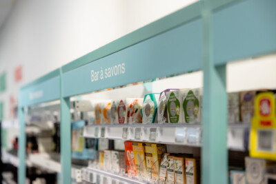 Medi-Market health & beauty retail display with soap and personal care products on turquoise shelving