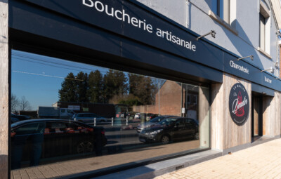 La Maison du Boudin artisanal butcher shop storefront with navy signage and large window display