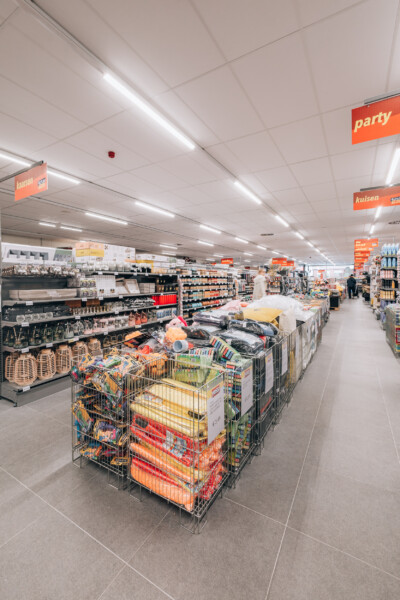 Yess Waregem supermarket interior with Pitch shelving displaying party supplies, kitchen items and household goods