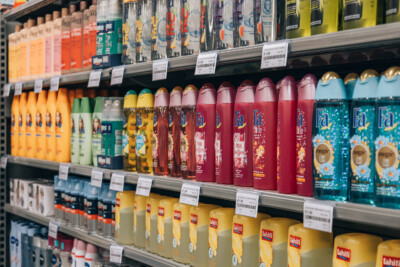 Personal care and beauty products displayed on Pitch 25 shelving in supermarket retail environment