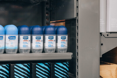 Sanex Men Active Control deodorant roll-on display on Pitch 25 shelving in health and beauty retail section