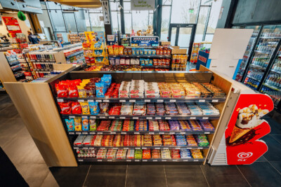 Pitch 25 shelving display with candy and chocolate products in convenience store