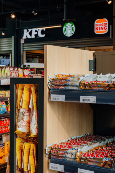 Pitch 25 shelving display with Twix and confectionery products in convenience retail environment