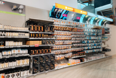 Pitch 41 shelving display with LEDVANCE LED products in retail lighting section, orange and blue packaging