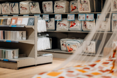 Pitch 25 shelving displaying packaged bedding products in health & beauty retail environment