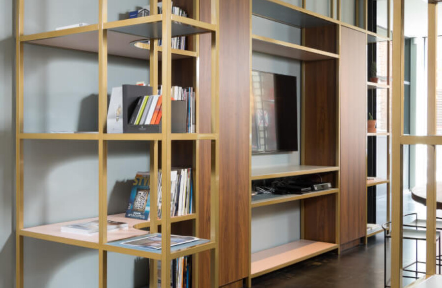 Pitch 25 shelving system with wooden frames and glass partitions in office showroom interior