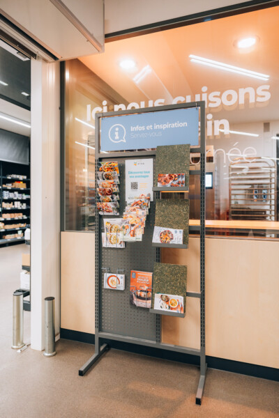 Pitch 25 shelving display with product information and branding materials in health & beauty retail setting