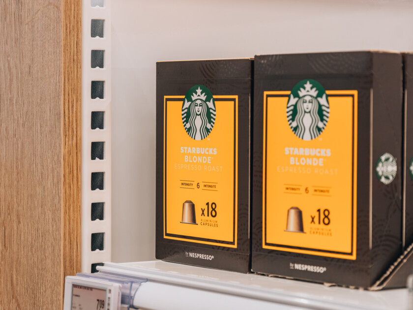 Starbucks Blonde Espresso Roast Nespresso capsules displayed on retail shelving