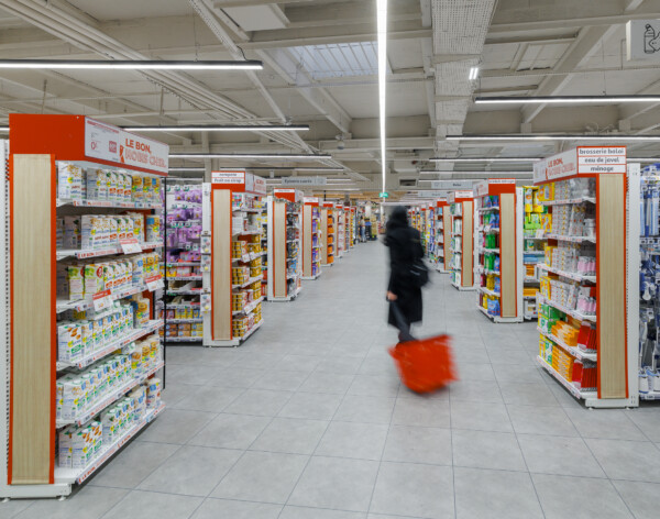 Le Bon supermarket aisle with Pitch shelving displaying groceries and household products